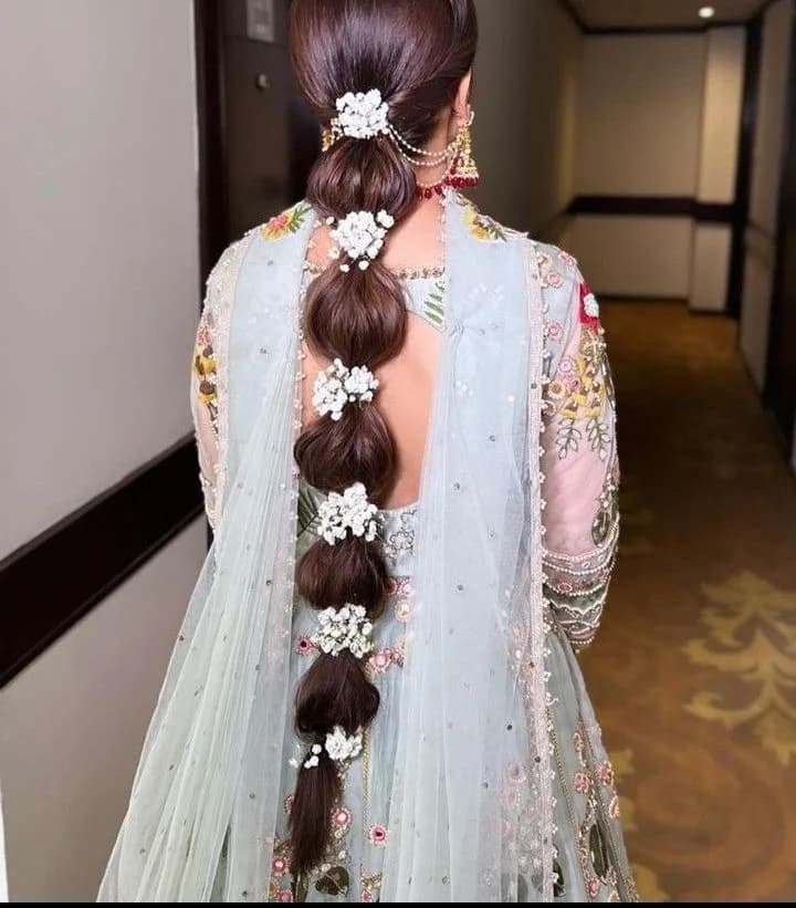 Segmented bubble braid dressed with small white flowers at every join